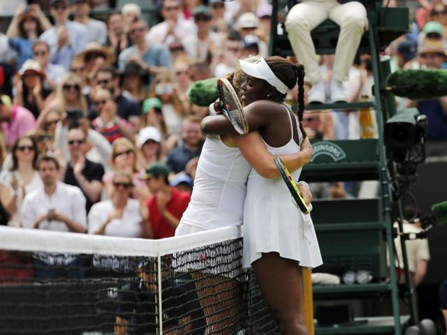 Svetlana Kuznetsova hugs Sloane Stephens at the net after her win. (AP)