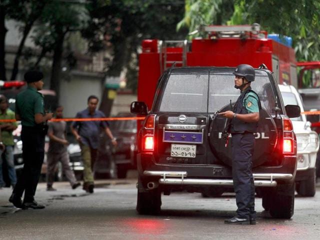 Bangladeshi security officers cordon off the area of the attack in the country’s diplomatic zone after Friday’s attack, on Saturday. (AP)