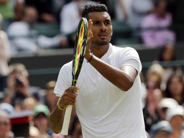 Nick Kyrgios shakes hands with Feliciano Lopez at the net after the match. (AP) Nick Kyrgios shakes hands with Feliciano Lopez at the net after the match. (AP)