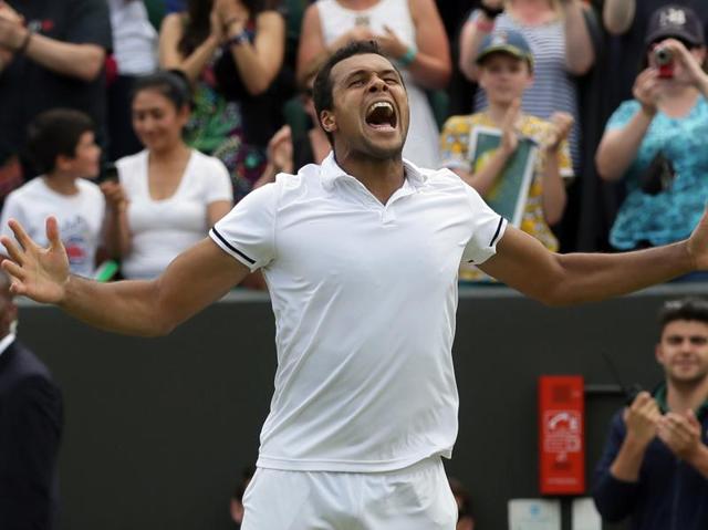 Jo-Wilfried Tsonga celebrates his marathon victory. (AP)