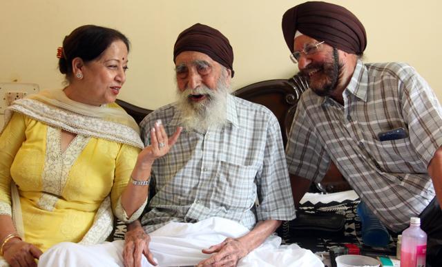 Daljit Singh, 100, sharing a light moment with daughter-in-law, Harvinder Kaur, as his son, Major General MS Chandoke (retd), looks on at their house in Sector 33, Chandigarh. (Anil Dayal/HT Photo) Daljit Singh, 100, sharing a light moment with daughter-in-law, Harvinder Kaur, as his son, Major General MS Chandoke (retd), looks on at their house in Sector 33, Chandigarh. (Anil Dayal/HT Photo)