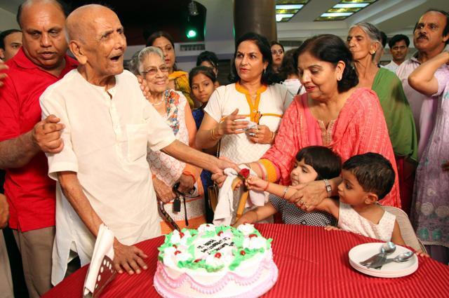 NO GENERATION GAP: MC Sharma accepting greetings from his great grandchildren at his 100th birthday party in Ludhiana last Sunday. (Anil Dayal/HT Photo) NO GENERATION GAP: MC Sharma accepting greetings from his great grandchildren at his 100th birthday party in Ludhiana last Sunday. (Anil Dayal/HT Photo)