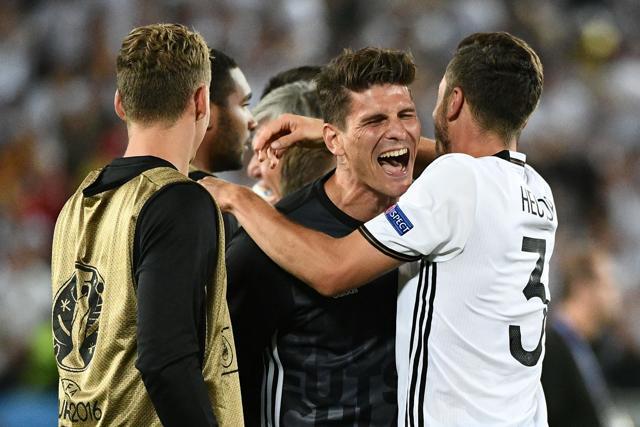 Germany's defender Jonas Hector celebrates after scoring a goal during a spot-kick in a penalty shootout to clinch the match for Germany in the Euro 2016 quarterfinals. (AFP Photo) Germany's defender Jonas Hector celebrates after scoring a goal during a spot-kick in a penalty shootout to clinch the match for Germany in the Euro 2016 quarterfinals. (AFP Photo)
