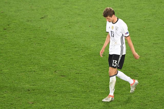 Thomas Mueller reacts after missing his penalty. (AFP) Thomas Mueller reacts after missing his penalty. (AFP)