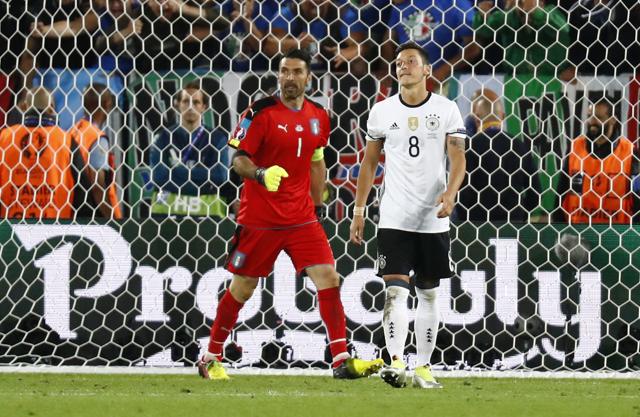 Buffon celebrates after Germany's Mesut Ozil misses the penalty. (REUTERS) Buffon celebrates after Germany's Mesut Ozil misses the penalty. (REUTERS)