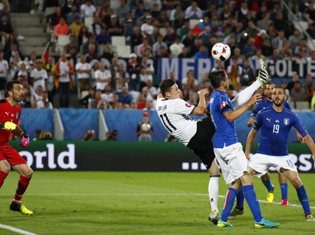 Germany's Julian Draxler shoots at the goal with an overhead kick. (REUTERS) 