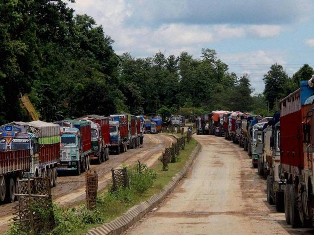 Vehicles stranded at NH 44 which was damaged due to incessant rains at Tripura and Assam border in Churaibari, North Tripura on June 24, 2016. (PTI) Vehicles stranded at NH 44 which was damaged due to incessant rains at Tripura and Assam border in Churaibari, North Tripura on June 24, 2016. (PTI)