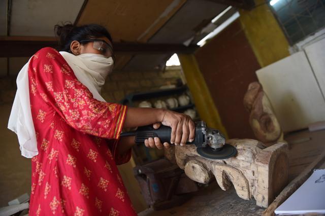 Hadiqa Asif, a third-year student at the Visual Arts department of Karachi University,works on a sculpture at her workshop in Karachi. (AFP) Hadiqa Asif, a third-year student at the Visual Arts department of Karachi University,works on a sculpture at her workshop in Karachi. (AFP)