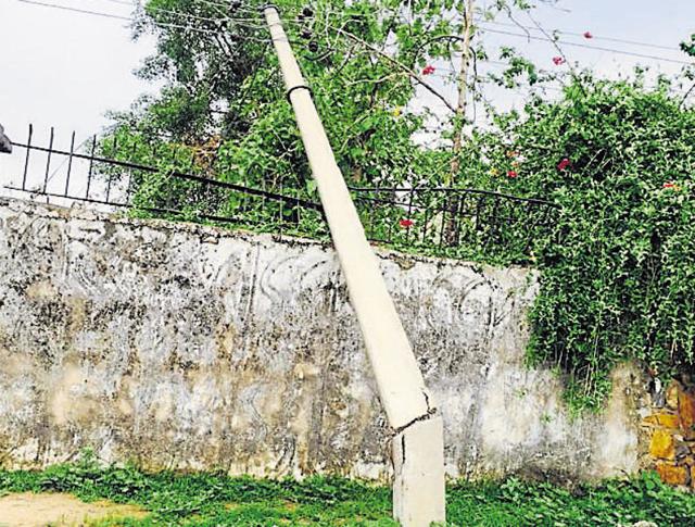 Power supply to the village was disrupted after a transformer and several electricity poles were broken. (HT Photo) Power supply to the village was disrupted after a transformer and several electricity poles were broken. (HT Photo)