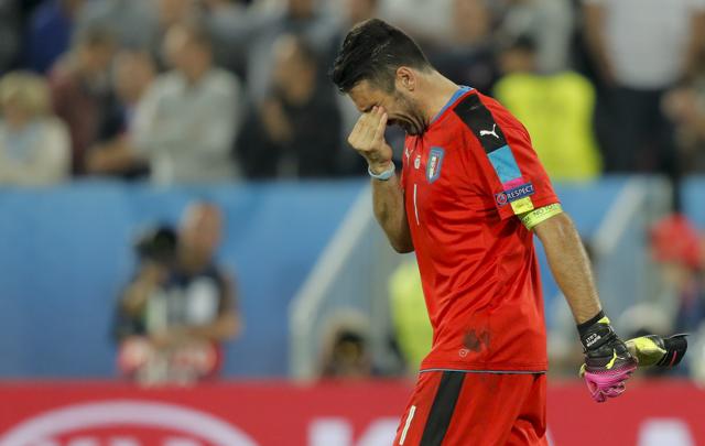 Buffon walks off the pitch at the end of the Euro 2016 quarterfinal soccer match against Germany. (AP) Buffon walks off the pitch at the end of the Euro 2016 quarterfinal soccer match against Germany. (AP)