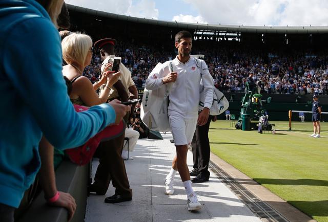 Djokovic leaves the court after losing to Sam Querrey in their men's singles third round match. (AFP Photo) Djokovic leaves the court after losing to Sam Querrey in their men's singles third round match. (AFP Photo)