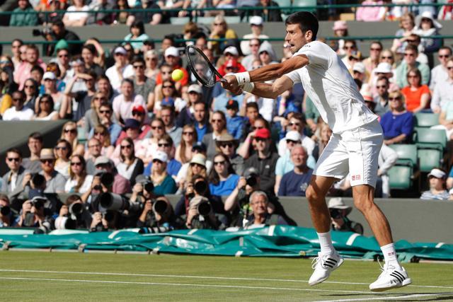 Serbia's Novak Djokovic returns to US player Sam Querrey during their men's singles third round match on the sixth day of the 2016 Wimbledon Championships. (AFP Photo) Serbia's Novak Djokovic returns to US player Sam Querrey during their men's singles third round match on the sixth day of the 2016 Wimbledon Championships. (AFP Photo)