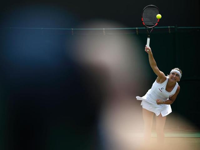 Switzerland's Timea Bacsinszky serves to Russia's Anastasia Pavlyuchenkova. Bacsinszky lost 3-6, 2-6. (AFP)