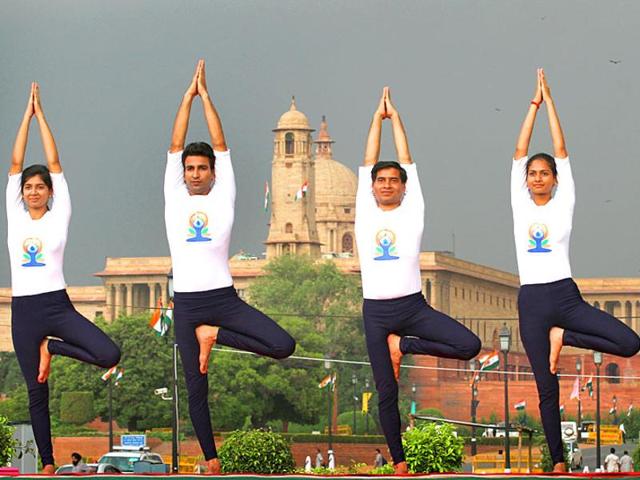 People perform yoga at Rajpath in New Delhi on International Yoga Day observed on June 21. (Arvind Yadav/ Hindustan Times File) People perform yoga at Rajpath in New Delhi on International Yoga Day observed on June 21. (Arvind Yadav/ Hindustan Times File)