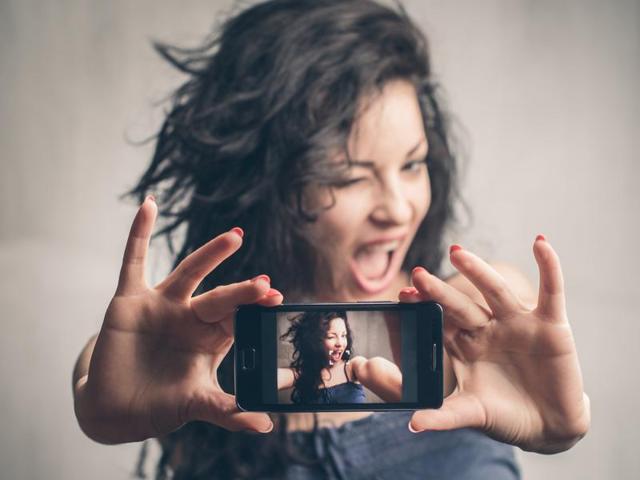 You get selfie elbow by taking too many selfies, as you put too much stress on the muscle, irritating the area where the muscle comes off the bone, and you get this inflammatory response, say doctors.(Shutterstock)