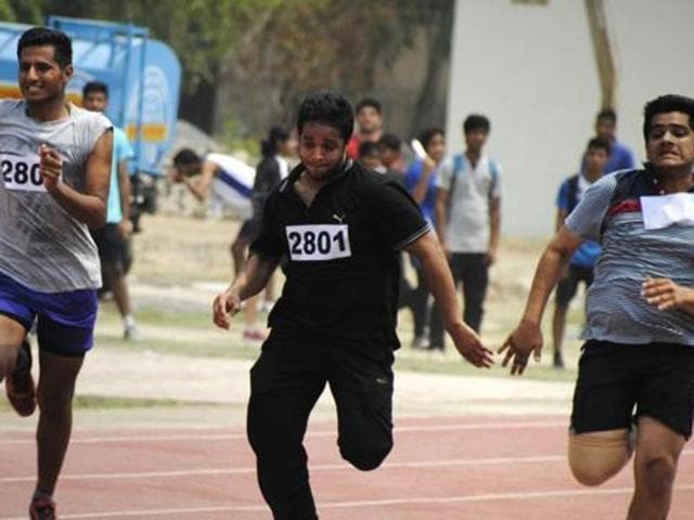 College students take part in an athletics event. College students take part in an athletics event.