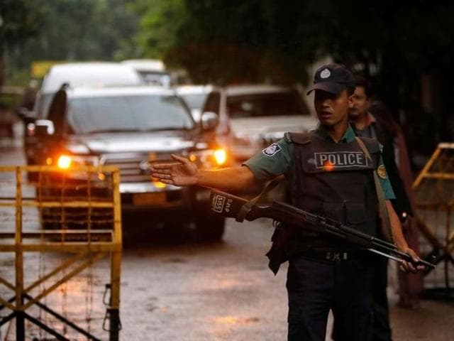 A policeman keeps watch near the Holey Artisan Bakery and the O'Kitchen Restaurant in Dhaka after a terror attack. (Reuters) A policeman keeps watch near the Holey Artisan Bakery and the O'Kitchen Restaurant in Dhaka after a terror attack. (Reuters)