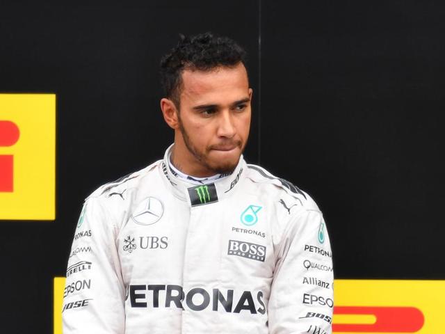 Mercedes driver Lewis Hamilton of Britain looks on, at the Austrian Grand Prix on Sunday, July 3, 2016. (AP) Mercedes driver Lewis Hamilton of Britain looks on, at the Austrian Grand Prix on Sunday, July 3, 2016. (AP)