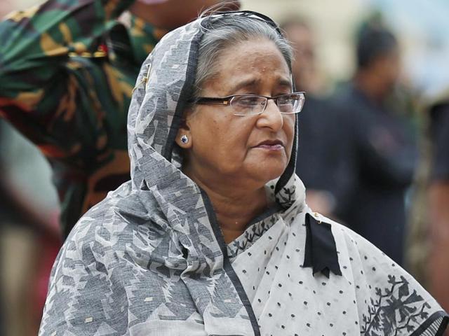 Bangladesh's Prime Minister Sheikh Hasina offers her tribute to the victims of the attack.(AP Photo) Bangladesh's Prime Minister Sheikh Hasina offers her tribute to the victims of the attack.(AP Photo)