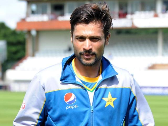 Pakistan's Mohammad Amir walks onto the field to warm up with teammates. (AP Photo) Pakistan's Mohammad Amir walks onto the field to warm up with teammates. (AP Photo)