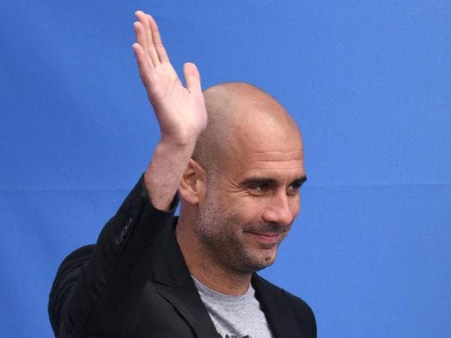 Pep Guardiola speaks to Manchester City fans as he is officially unveiled as the club's new manager at the City Football Academy in Manchester, England on July 3, 2016. (AFP) Pep Guardiola speaks to Manchester City fans as he is officially unveiled as the club's new manager at the City Football Academy in Manchester, England on July 3, 2016. (AFP)
