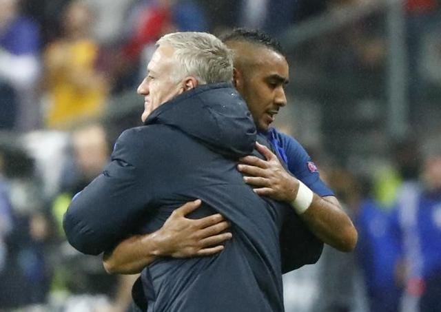 Dimitri Payet is embraced by coach Didier Deschamps after his substitution. (Reuters) Dimitri Payet is embraced by coach Didier Deschamps after his substitution. (Reuters)
