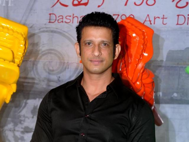 Sharman Joshi poses for the shutterbugs a party for a newly-opened restaurant in Mumbai. (AFP) 