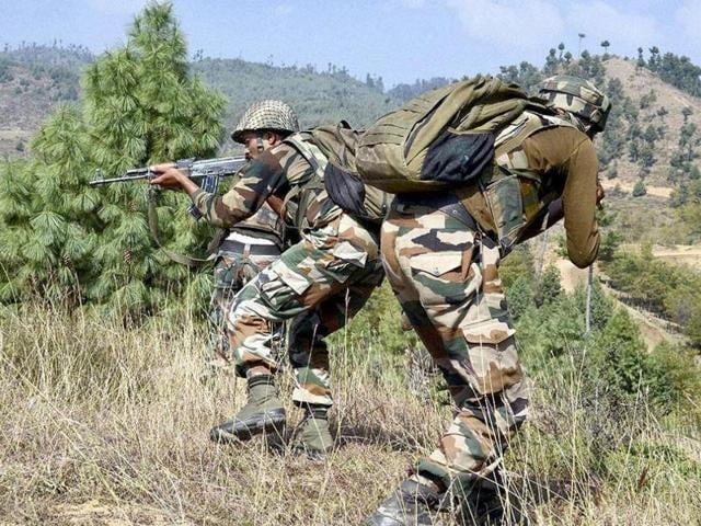 File photo of Indian Army soldiers taking position during an encounter with militants in Keran sector of Jammu and Kashmir. (PTI)
