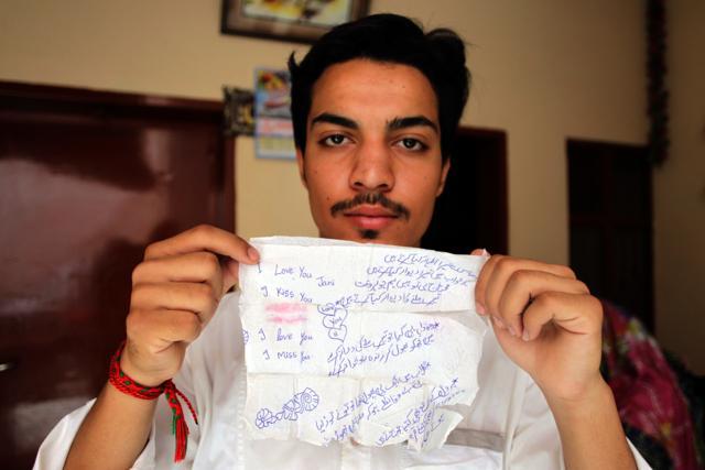 Hassan Khan shows a tissue on which his wife Zeenat wrote a poem and messages to him, in Lahore, Pakistan. Zeenat was the third Pakistani girl reported to have died in the last month in what has widely come to be known as an honour killing. (AP Photo) Hassan Khan shows a tissue on which his wife Zeenat wrote a poem and messages to him, in Lahore, Pakistan. Zeenat was the third Pakistani girl reported to have died in the last month in what has widely come to be known as an honour killing. (AP Photo)