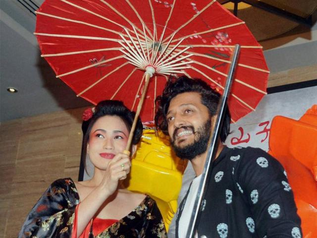 Riteish Deshmukh strikes a pose at a newly-opened restaurant in Mumbai. (PTI)