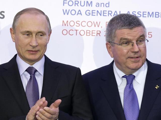 Russian President Vladimir Putin, left, and International Olympic Committee (IOC) President Thomas Bach. (AP) Russian President Vladimir Putin, left, and International Olympic Committee (IOC) President Thomas Bach. (AP)