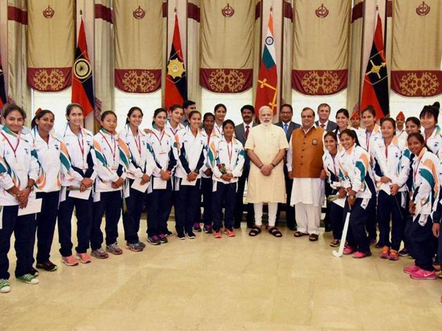 Prime Minister Narendra Modi poses with sportspersons. (PTI photo) Prime Minister Narendra Modi poses with sportspersons. (PTI photo)