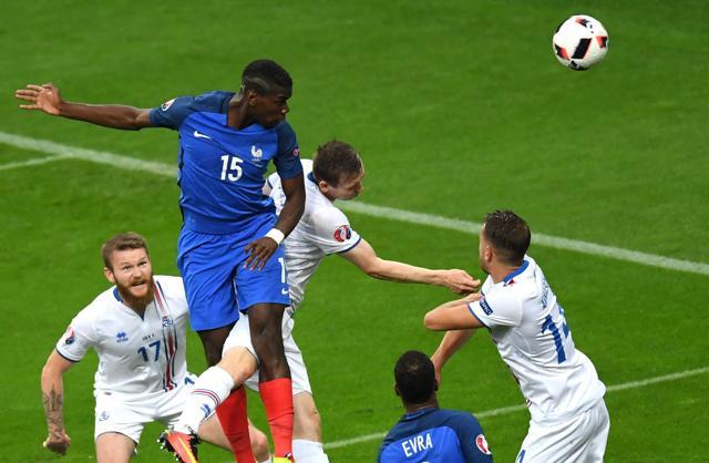 Pogba (2L) heads in for France’s second goal. (AFP) Pogba (2L) heads in for France’s second goal. (AFP)