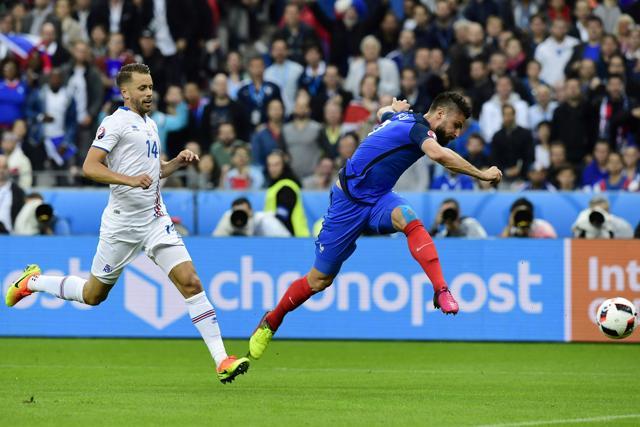 Olivier Giroud (R) shoots to score the first goal for France. (AFP) Olivier Giroud (R) shoots to score the first goal for France. (AFP)