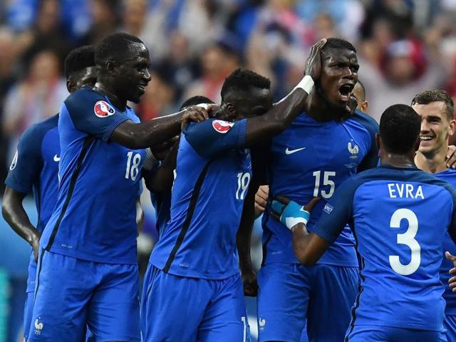 France teammates celebrate with scorer France's midfielder Paul Pogba (15) the team's second goal. (AFP photo) 