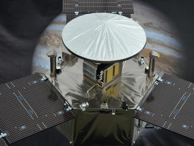 A 1/4 scale model of NASA's Juno Spacecraft is seen in front of an image of Jupiter, at the Jet Propulsion Laboratory (JPL) in Pasadena, California. (AFP Photo) A 1/4 scale model of NASA's Juno Spacecraft is seen in front of an image of Jupiter, at the Jet Propulsion Laboratory (JPL) in Pasadena, California. (AFP Photo)