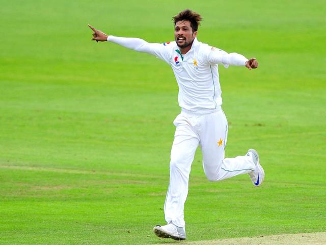Pakistan's Mohammad Amir celebrates taking a wicket during day two of the Somerset versus Pakistan tour match at the County Ground, Taunton, south western England. (AP Photo) Pakistan's Mohammad Amir celebrates taking a wicket during day two of the Somerset versus Pakistan tour match at the County Ground, Taunton, south western England. (AP Photo)
