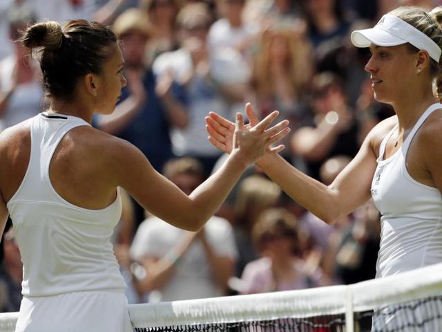 Kerber, right, shakes hands with Halep at the net. (AP)