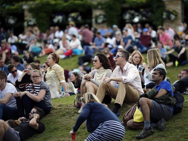 Spectators watch the action during day seven of the Wimbledon Tennis Championships in London. (AP Photo) Spectators watch the action during day seven of the Wimbledon Tennis Championships in London. (AP Photo)