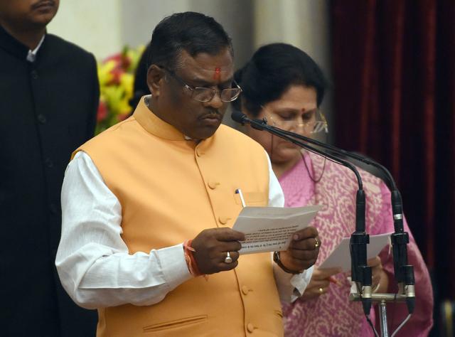 Bharatiya Janata Party (BJP) politician, Faggan Singh Kulaste takes the oath as minister of state. (AFP) Bharatiya Janata Party (BJP) politician, Faggan Singh Kulaste takes the oath as minister of state. (AFP)