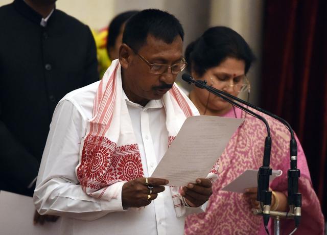 Bhartiya Janata Party (BJP) Leader Rajen Gohain takes the oath as minister of state. (AFP) Bhartiya Janata Party (BJP) Leader Rajen Gohain takes the oath as minister of state. (AFP)