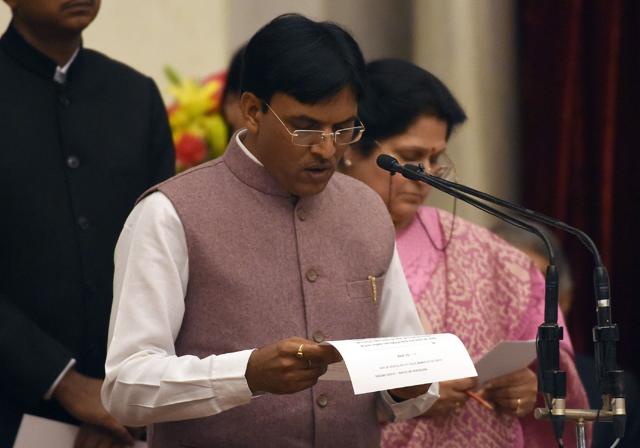 Bharatiya Janata Party (BJP) politician, Mansukh Mandaviya takes the oath as minister of state. (AFP) Bharatiya Janata Party (BJP) politician, Mansukh Mandaviya takes the oath as minister of state. (AFP)