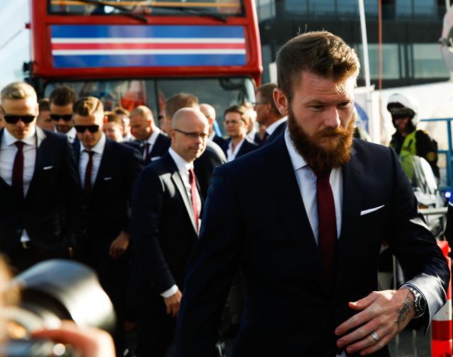 The captain of the Iceland team, Aron Einar Gunnarsson, walks on stage in Reykjavik. (AP Photo)