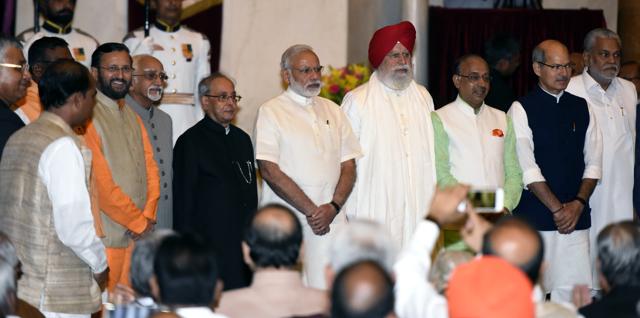 President Pranab Mukherjee, Prime Minister Narendra Modi and vice-President Hamid Ansari with all the newly inducted ministers during their swearing-in ceremony. (Sonu Mehta/Hindustan Times) President Pranab Mukherjee, Prime Minister Narendra Modi and vice-President Hamid Ansari with all the newly inducted ministers during their swearing-in ceremony. (Sonu Mehta/Hindustan Times)