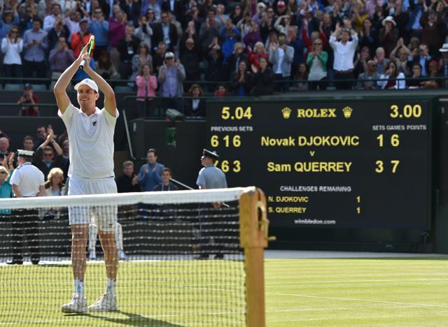 US player Sam Querrey celebrates beating Serbia's Novak Djokovic during their men's singles third round match. (AFP Photo)