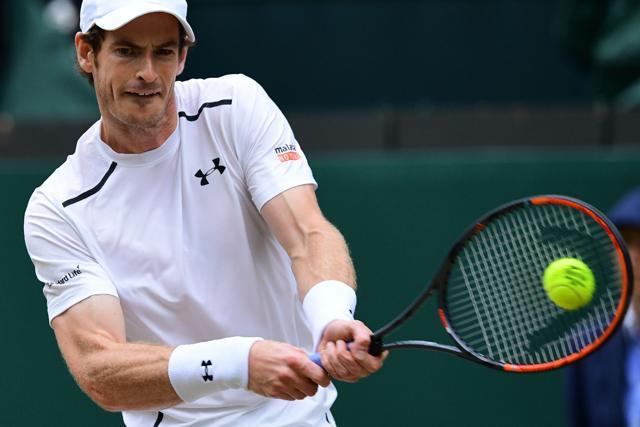 Australia's Nick Kyrgios returns to Britain's Andy Murray during their men's singles fourth round match on the eighth day of the 2016 Wimbledon Championships. (AFP Photo) Australia's Nick Kyrgios returns to Britain's Andy Murray during their men's singles fourth round match on the eighth day of the 2016 Wimbledon Championships. (AFP Photo)
