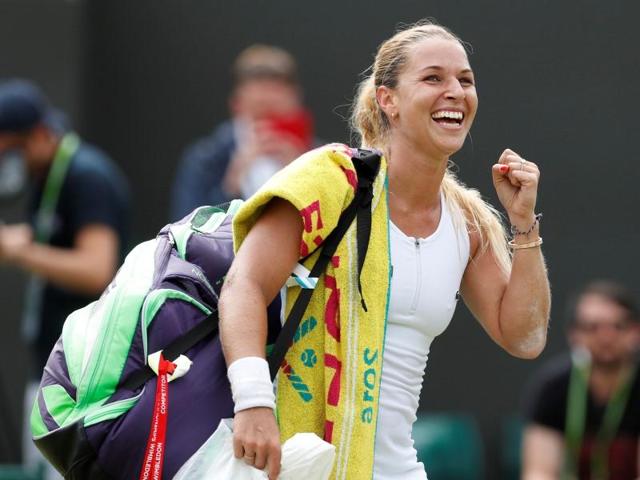 Slovakia's Dominika Cibulkova celebrates after she won a Wimbledon match against Agnieszka Radwanska. Slovakia's Dominika Cibulkova celebrates after she won a Wimbledon match against Agnieszka Radwanska.