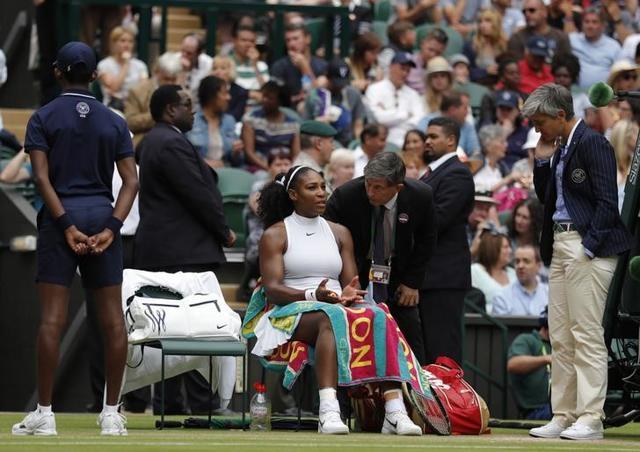 Serena Williams talks to the umpire and officials after slipping during her match against Russia's Svetlana Kuznetsova. (Reuters Photo) Serena Williams talks to the umpire and officials after slipping during her match against Russia's Svetlana Kuznetsova. (Reuters Photo)