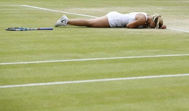 Slovakia's Dominika Cibulkova celebrates winning her match against Poland's Agnieszka Radwanska. (Reuters Photo)
