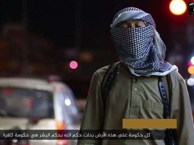 Screen grab of fighter from Islamic State video. (YouTube) Screen grab of fighter from Islamic State video. (YouTube)